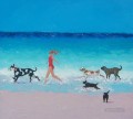 fille et chiens courir sur la plage